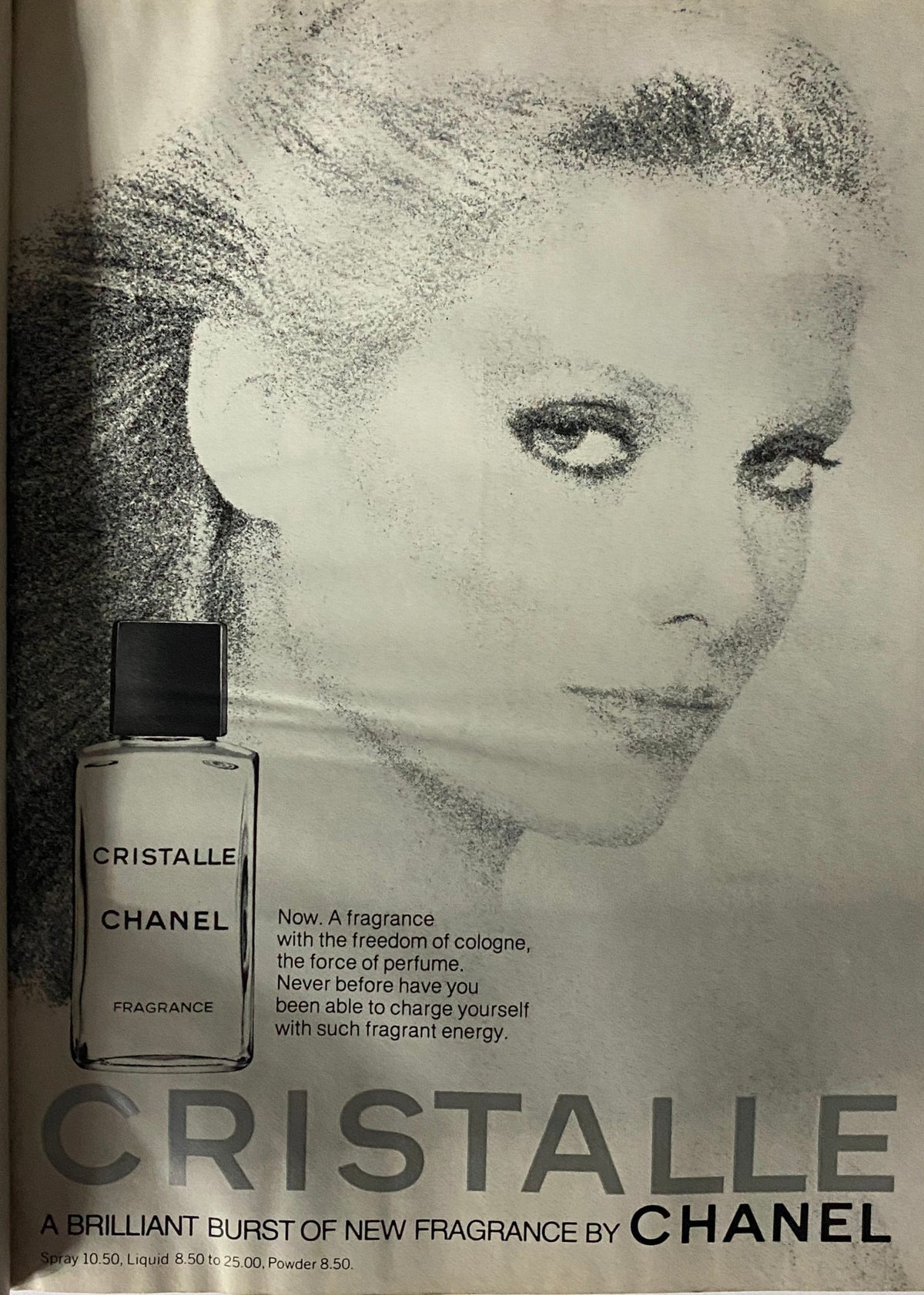 Advertisement for Cristalle perfume by Chanel featured in Vogue Magazine October 1977, emphasizing its unique fragrance qualities.