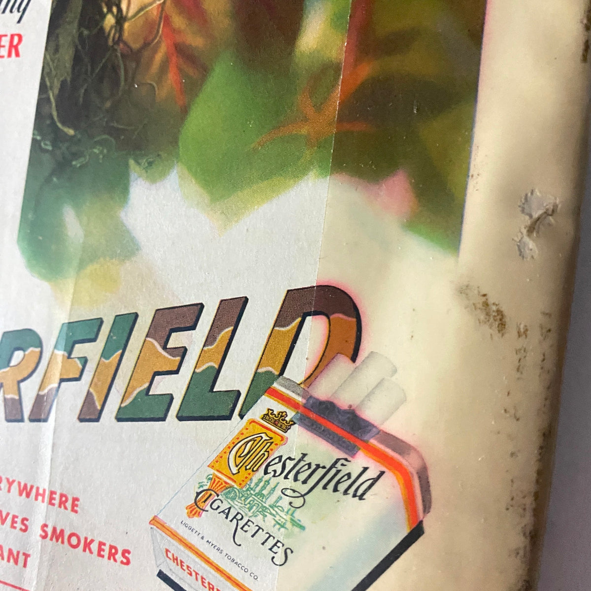 Close-up of the vintage cover of Mademoiselle Magazine May 1943, featuring the word 'Chesterfield' and an advertisement for Chesterfield cigarettes, illustrating mid-20th century advertising aesthetics.