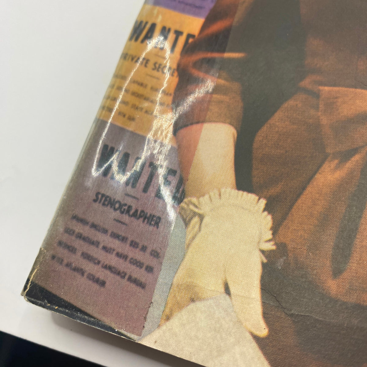 Close-up of the Mademoiselle Magazine May 1941 Career Number cover detail, showcasing 'Wanted' job listings and the woman's elegant hand in a glove.