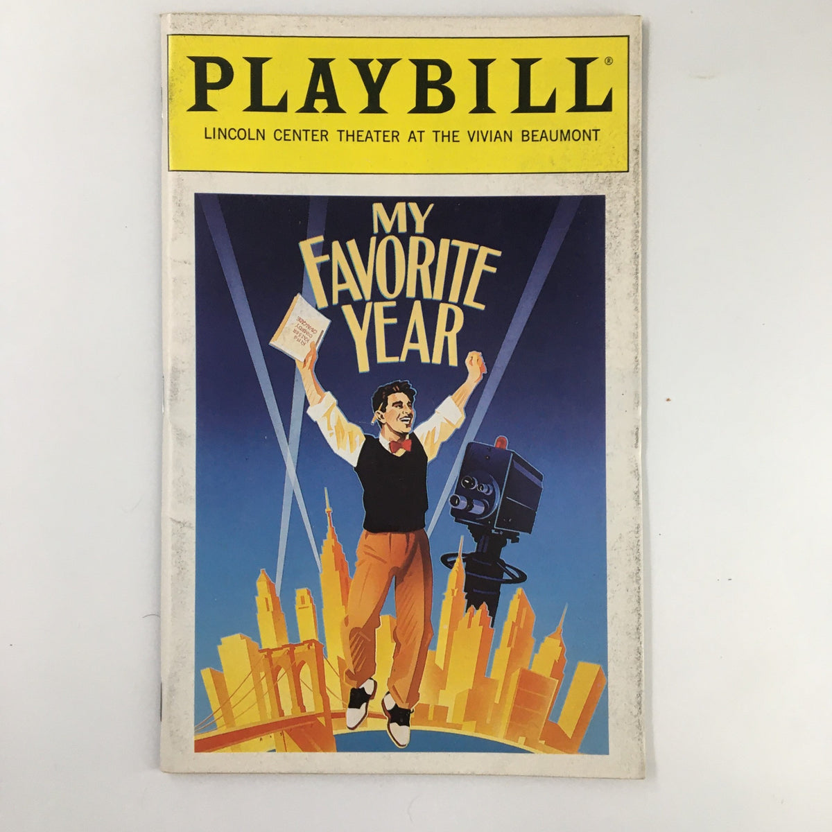 1992 Playbill for My Favorite Year at Lincoln Center Theater featuring vibrant cover artwork with a performer celebrating on stage.