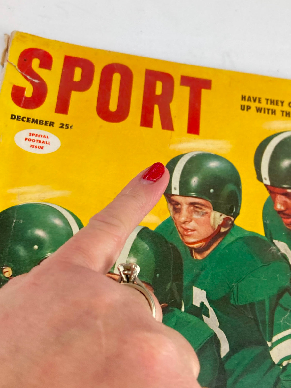 Detailed shot of the VTG Sport Magazine December 1953 Vol 15 #6 cover, emphasizing The Ben Hogan Story and special football issue sticker.