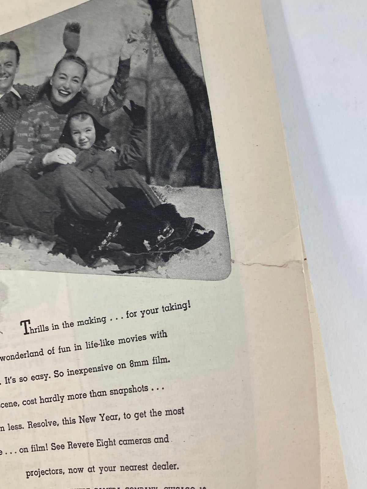 VTG Sport Magazine January 1948 Ralph Beard and Arnold Ferrin - Vintage advertisement showing a family enjoying outdoor activities in winter attire, with a nostalgic appeal.