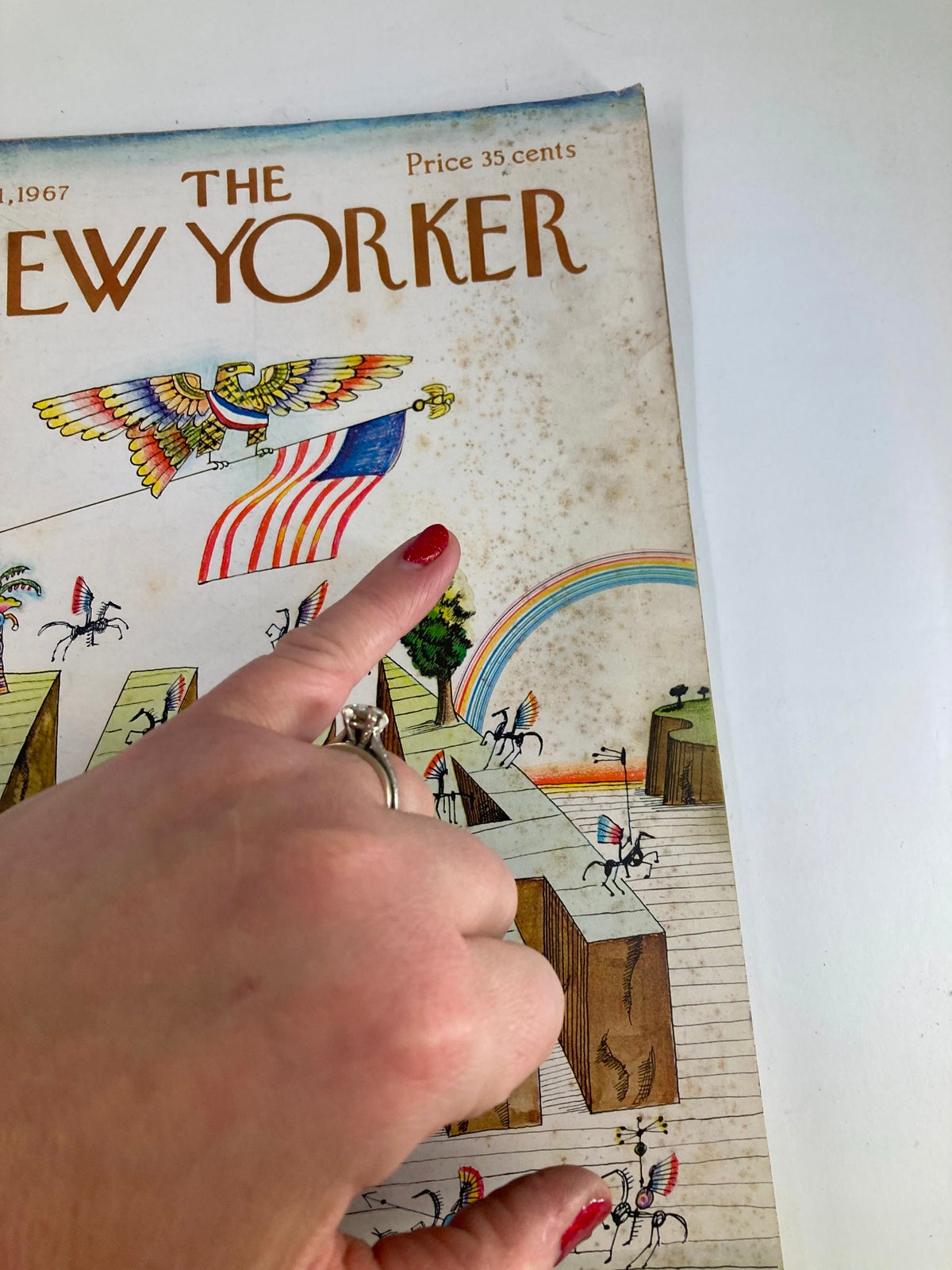 Close-up view of The New Yorker Full Magazine July 1 1967 cover, highlighting the intricate details and vibrant illustrations by Saul Steinberg.