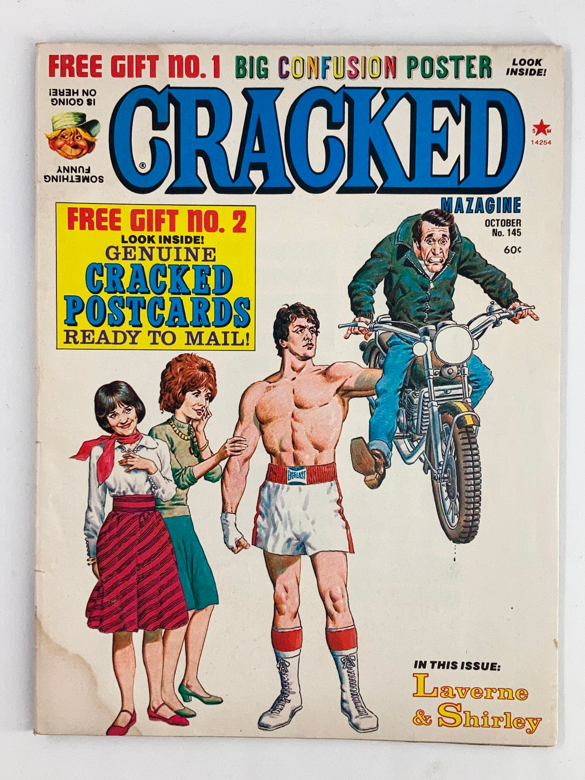 Cover of the VTG Cracked Humor Magazine October 1977 featuring Laverne and Shirley with advertisements for free gifts and a blend of humor and nostalgia.