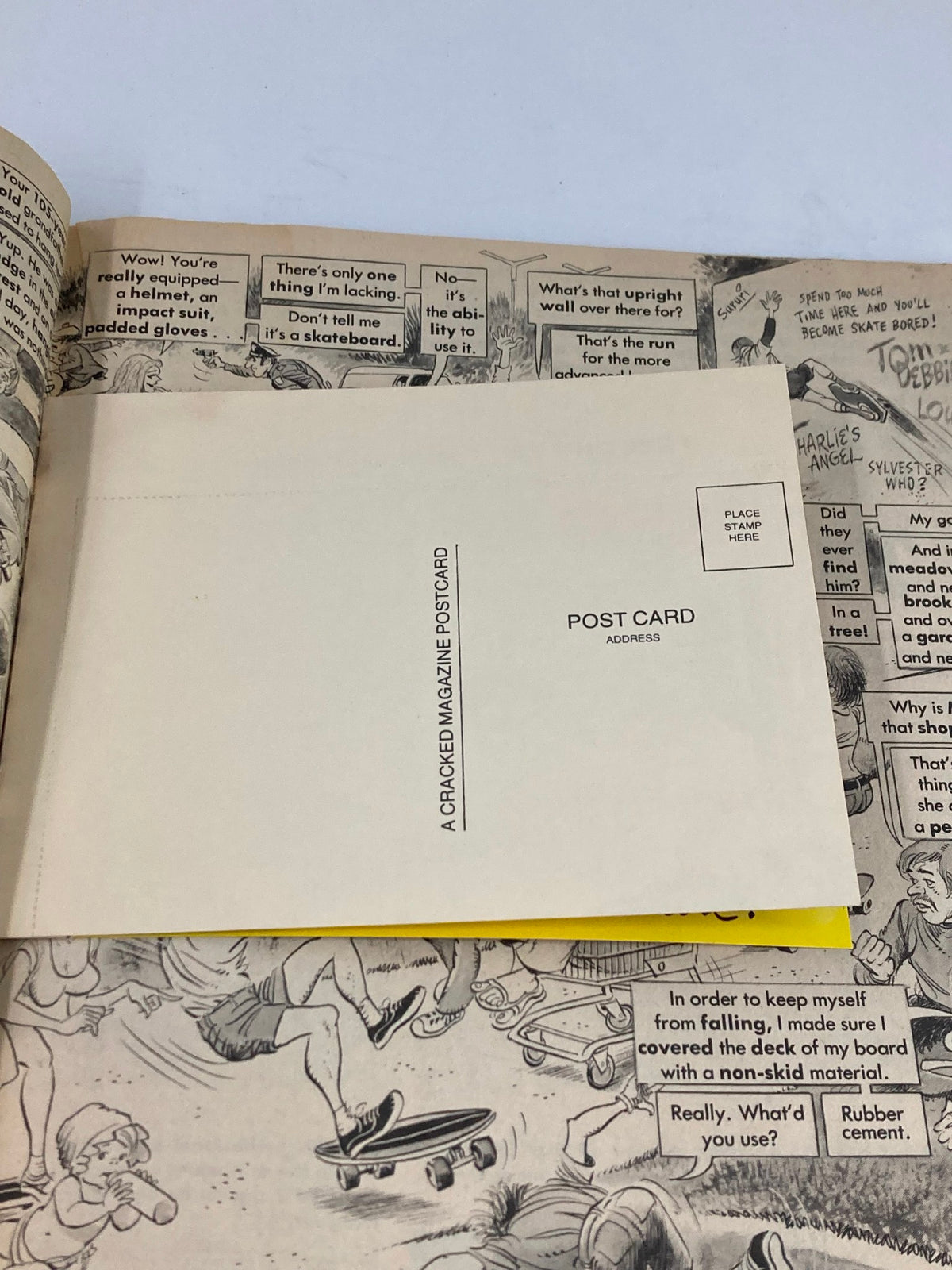 Vintage Cracked Humor Magazine October 1977, featuring a postcard page with humorous comic strip elements. The image shows dialogue and illustrations typical of late 1970s humor, emphasizing the charm of this collectible magazine.