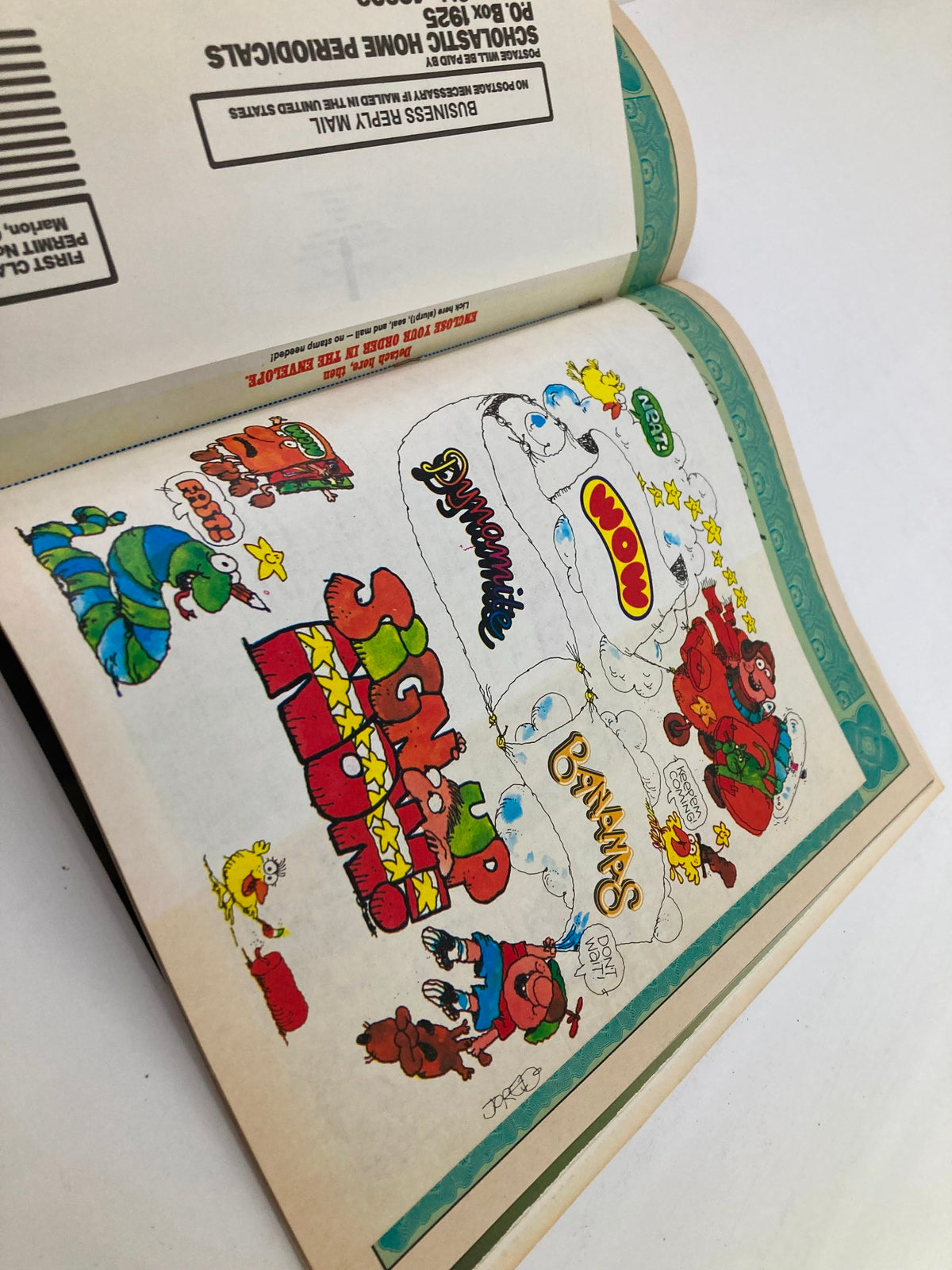 Another interior page of VTG Dynamite Magazine No. 53 displaying colorful graphics and advertisements for various pop culture items.