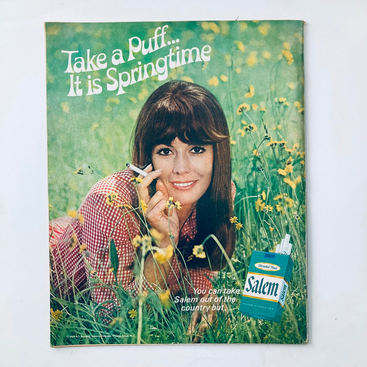 Vintage advertisement from VTG The Progressive Farmer Magazine September 1969 featuring a woman in a field promoting Salem cigarettes, reflecting the marketing styles of the late 1960s.