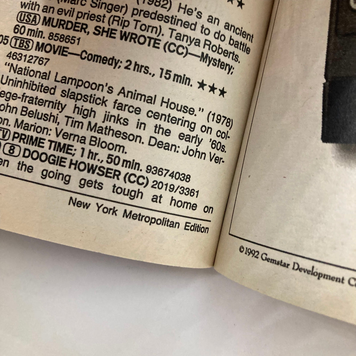 Interior page of the TV Guide Magazine November 21 1992 New York Metropolitan Edition, displaying TV show listings and details.