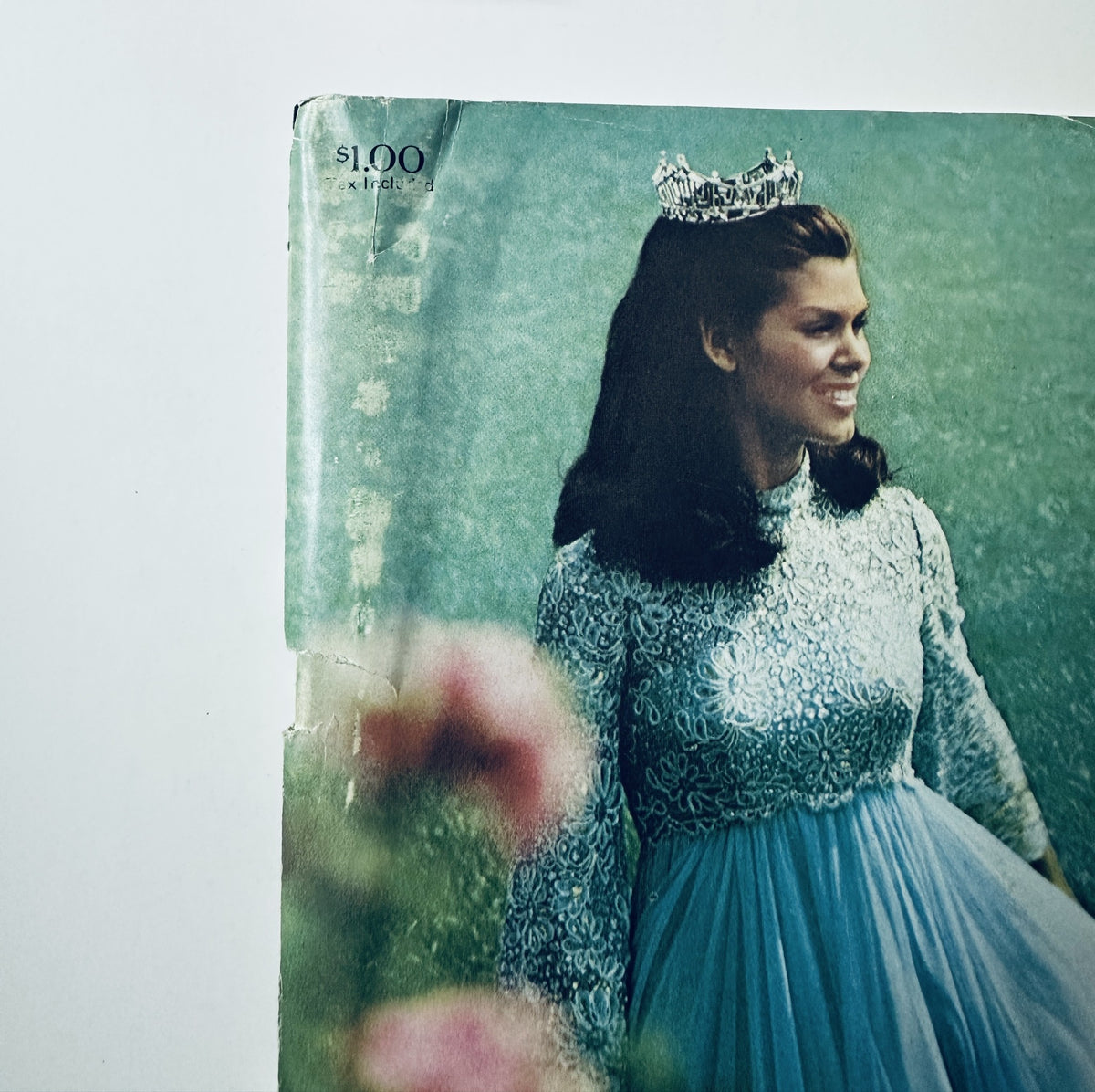 Close-up view of the Miss America Pageant Magazine cover from September 4–10, 1972, highlighting Laurie Schaefer wearing a crown with a scenic background, emphasizing the elegance of the event.