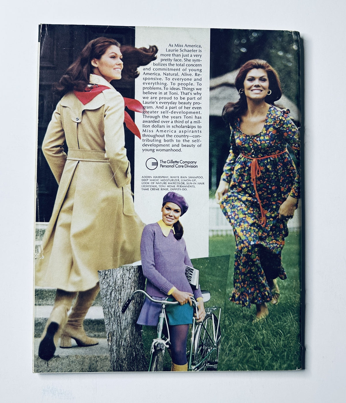 Back cover of the Miss America Pageant Magazine September 4–10, 1972, depicting a fashionable model in various outfits including a sleek coat and floral dress, emphasizing the cultural style of the era.