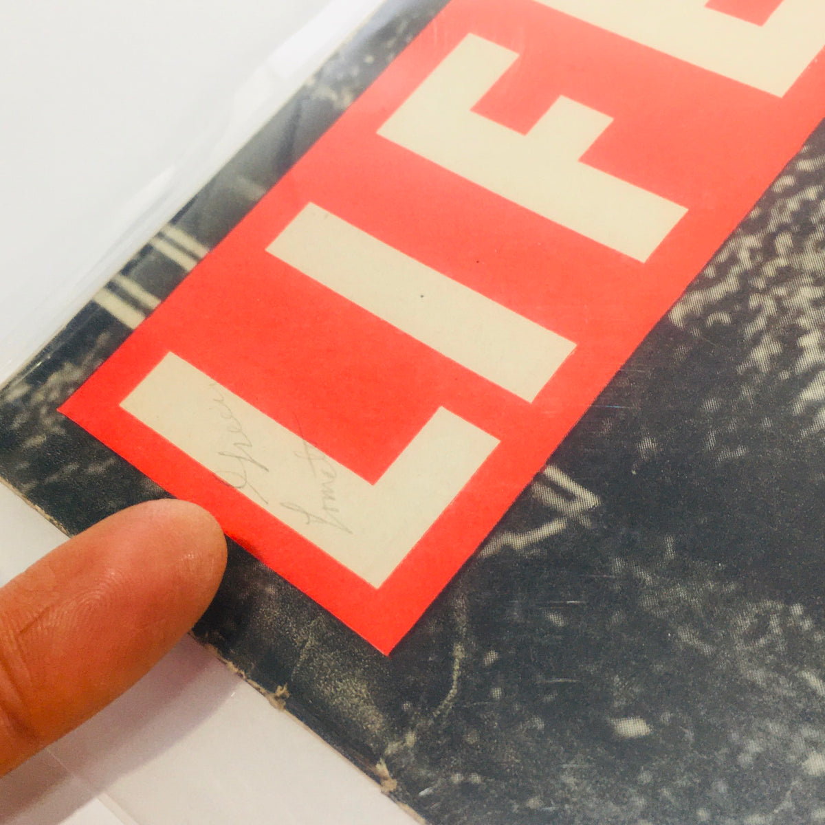 Close-up view of the cover of VTG Life Magazine: September 13 1943, highlighting the bold red 'LIFE' title against a black and white background, showcasing a piece of vintage fashion history featuring women in leotards.