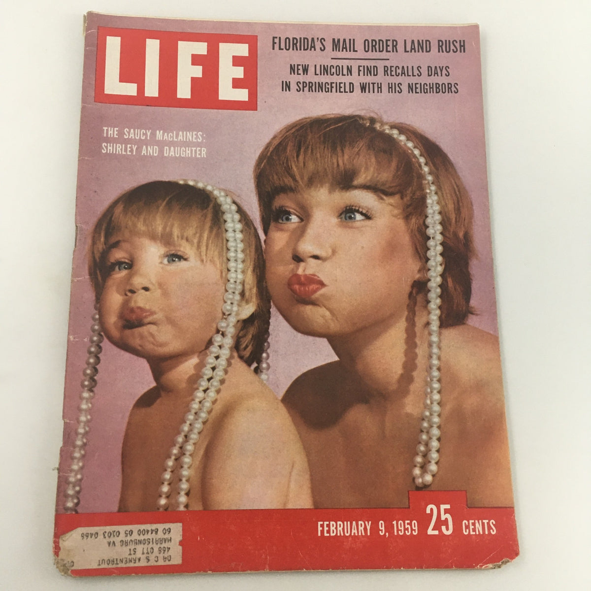 Vintage Life Magazine cover from February 9, 1959 titled 'The Saucy McLaines: Shirley and Daughter', featuring a playful image of a mother and daughter making funny faces with pearl necklaces.