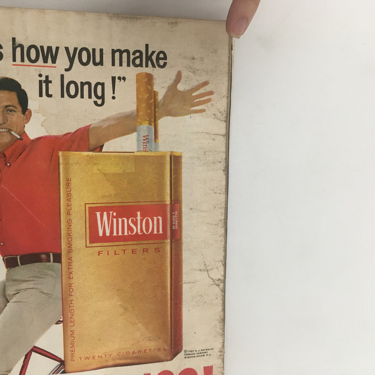Vintage Life Magazine October 27 1967 The Marines featuring an advertisement for Winston Filters cigarettes with a man holding a pack on the cover.