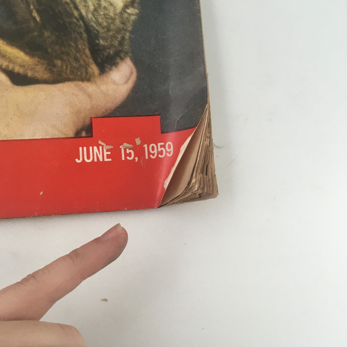 Detail of Vintage Life Magazine June 15 1959, showing the date and wear on the corner, highlighting its condition as a collectible piece of space exploration history.