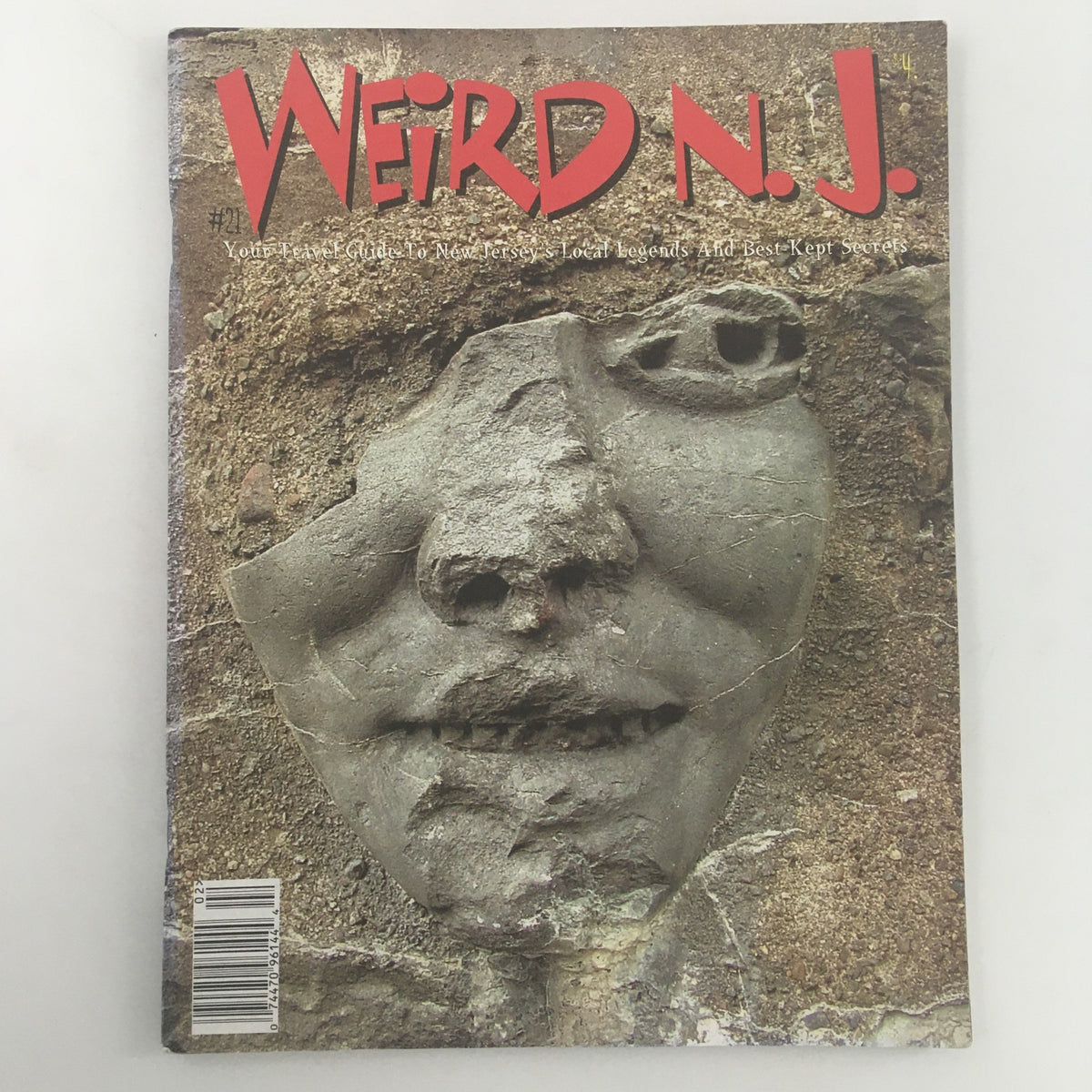 Cover of Weird N.J. Magazine 2003 Issue #21, showcasing a unique stone face sculpture, highlighting local legends and quirky stories of New Jersey.