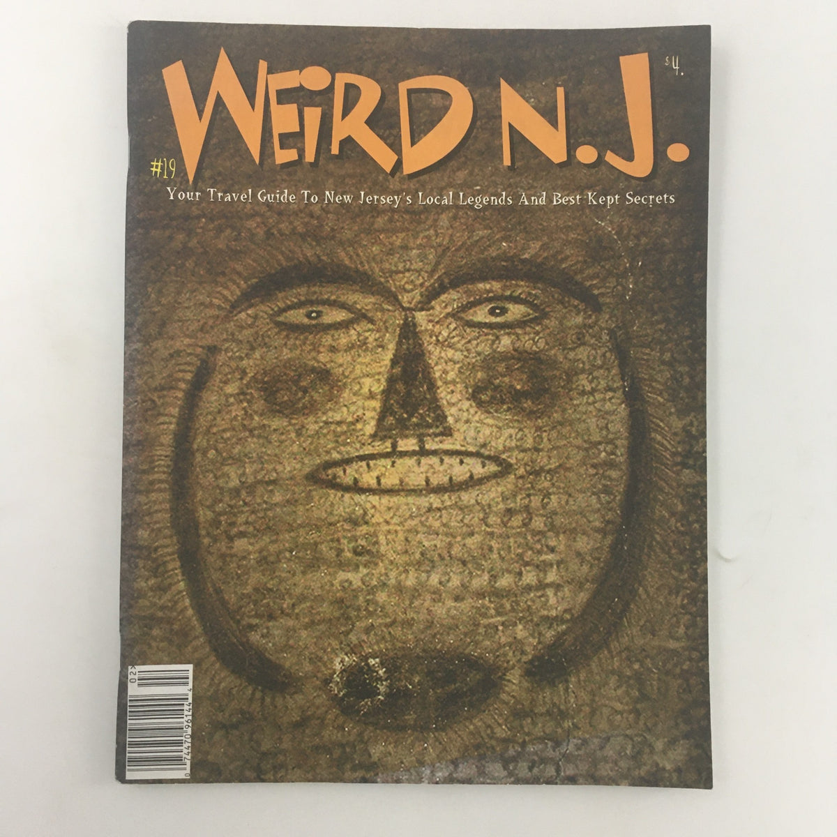 Weird N.J. Magazine 2002 Issue #19, featuring a unique cover art with a face design, serving as your travel guide to New Jersey's local legends and best-kept secrets.