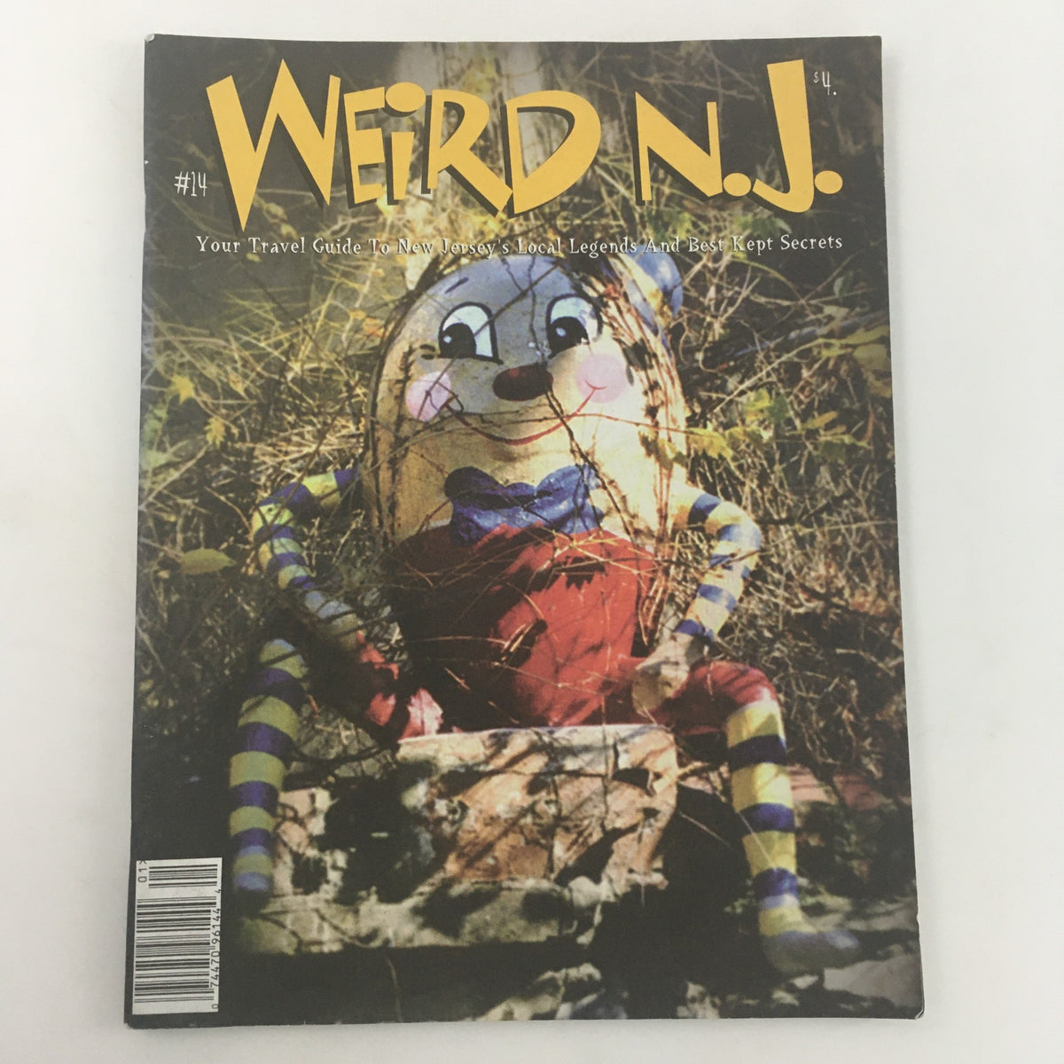 Weird N.J. Magazine 2000 Issue #14 cover featuring a whimsical character, serving as a travel guide to New Jersey's local legends and best-kept secrets.