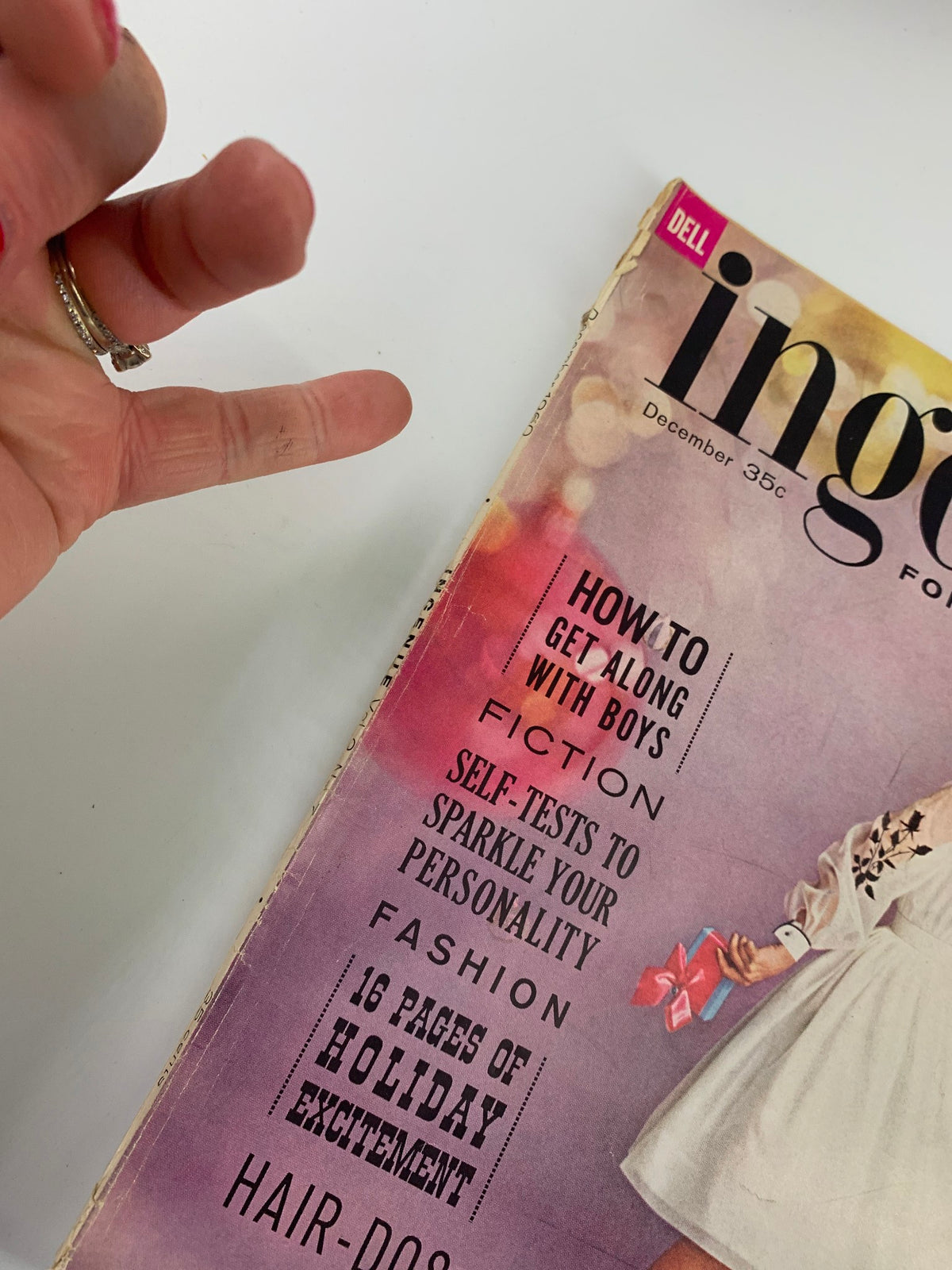 Close-up of the VTG Teen-Agers Ingenue Magazine December 1960 cover, emphasizing the headline 'How to Get Along with Boys' and various articles for teen girls.