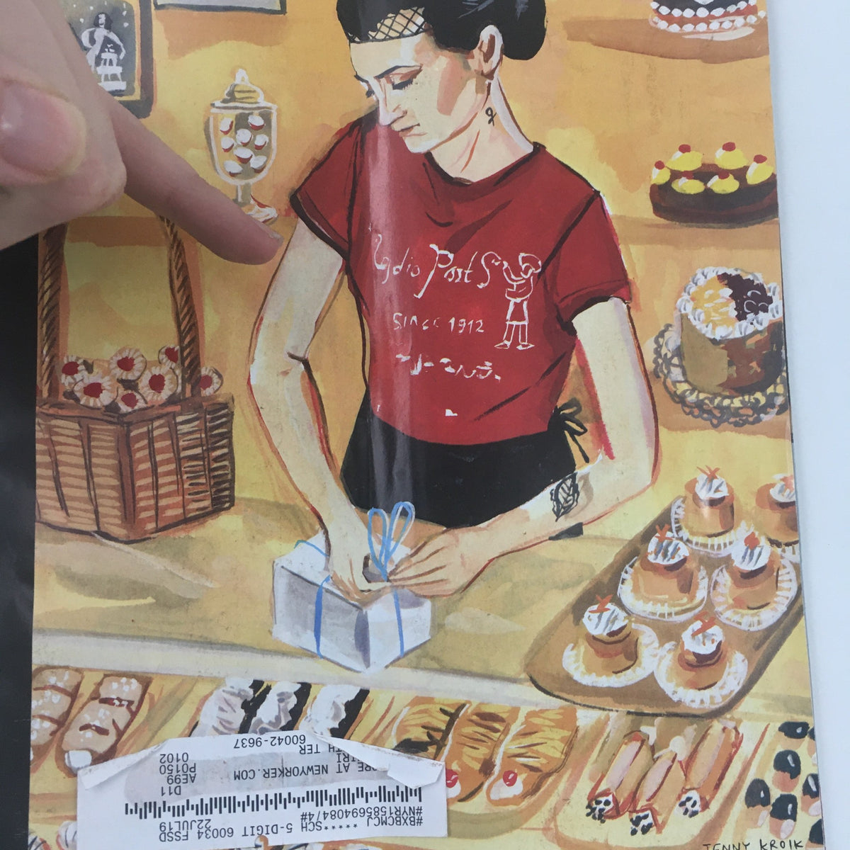 Close-up view of The New Yorker October 29 2018 Full Magazine Cover by Jenny Kroik showcasing a woman in a bakery wrapping a gift, surrounded by decorative pastries.