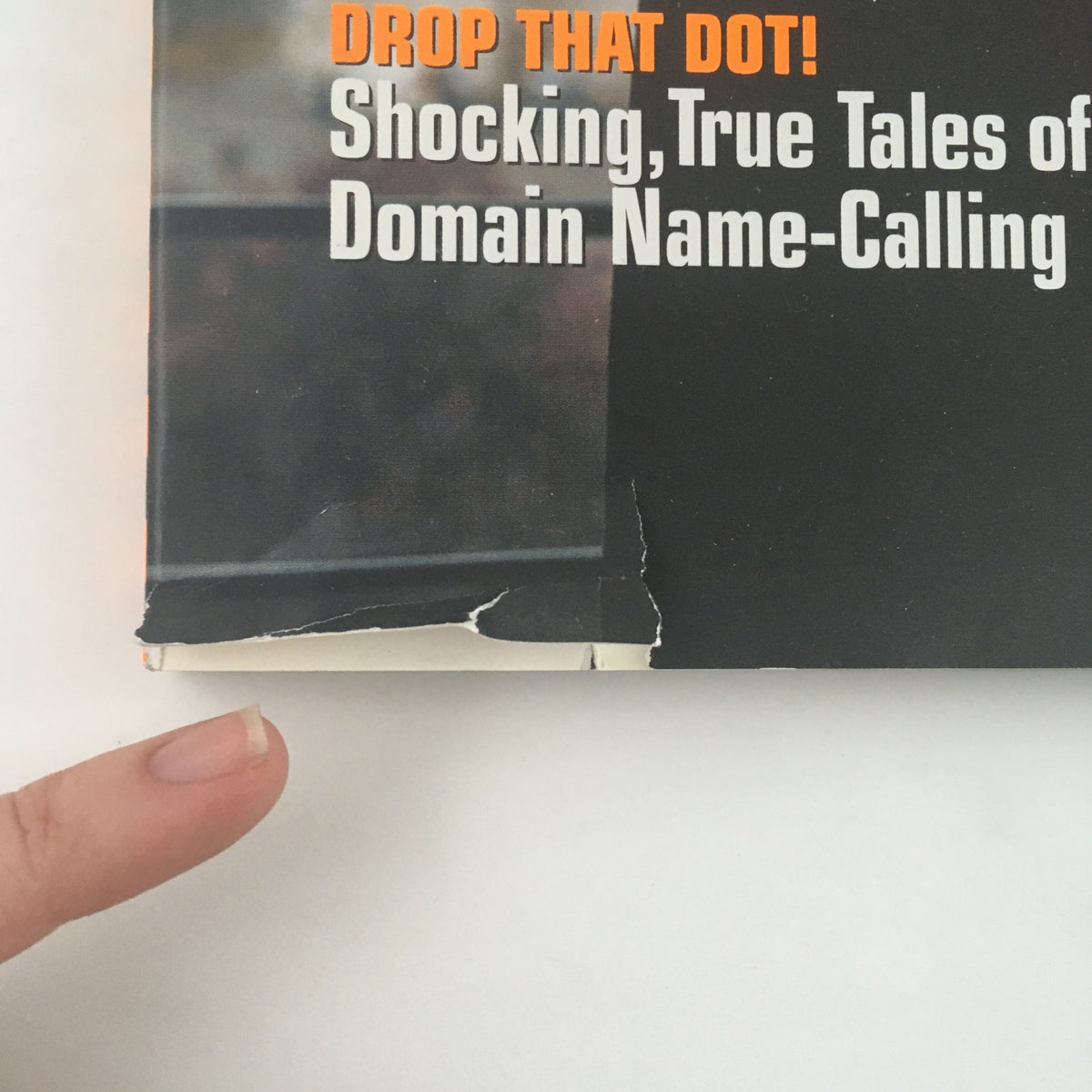 Close-up view of the December 2000 Wired Magazine showing damage to the bottom edge, highlighting the vintage condition of the publication.