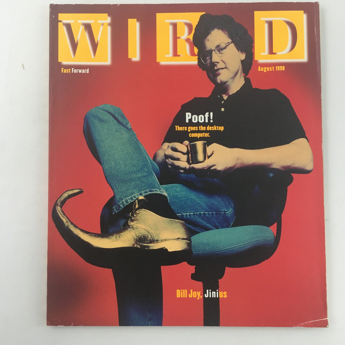 Wired Magazine August 1998 featuring Bill Joy on the cover, with a headline stating 'Poof! There goes the desktop computer.' A vintage magazine showcasing technology and innovation.
