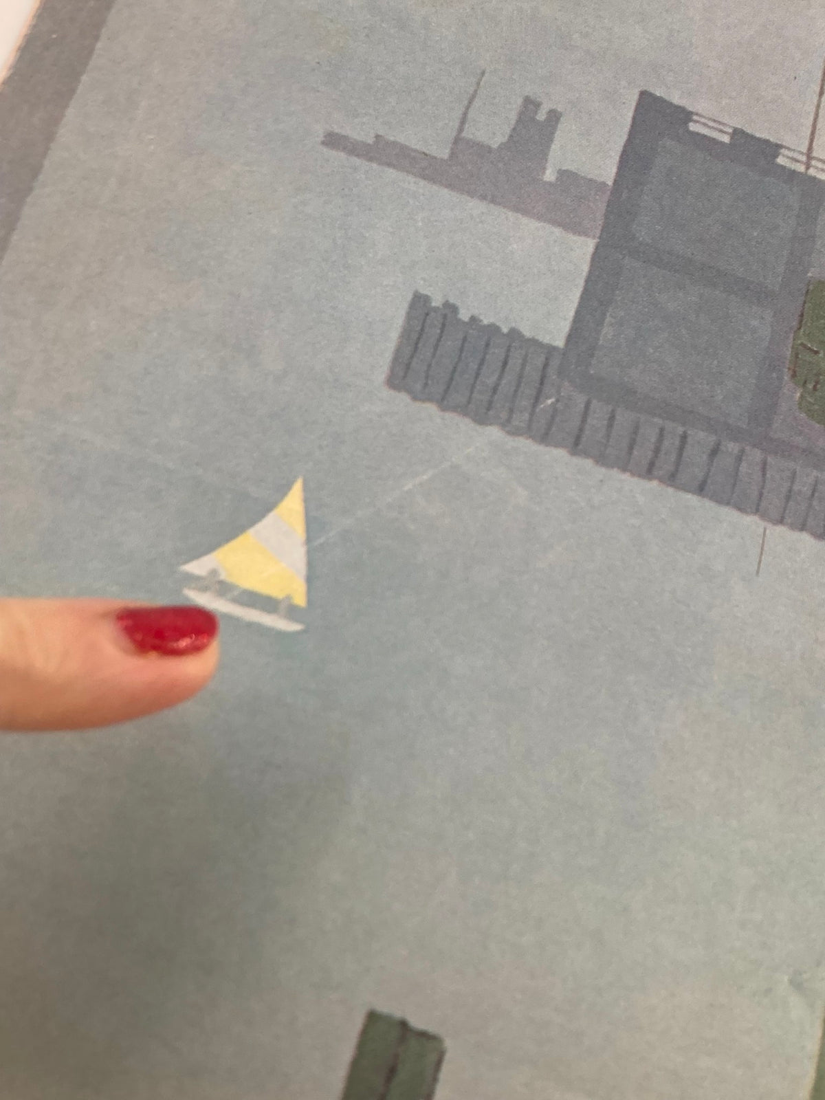 Close-up detail of the cover of The New Yorker August 18, 1980, highlighting the small sailboat in the artwork 'Sail Away' by Charles E. Martin.
