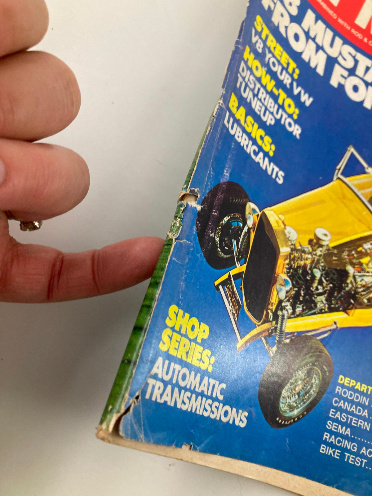 Close-up of the side of VTG Hot Rod Magazine June 1974 Vol 27 #6 highlighting wear and tear on the cover, maintaining its significance for collectors of automotive history.
