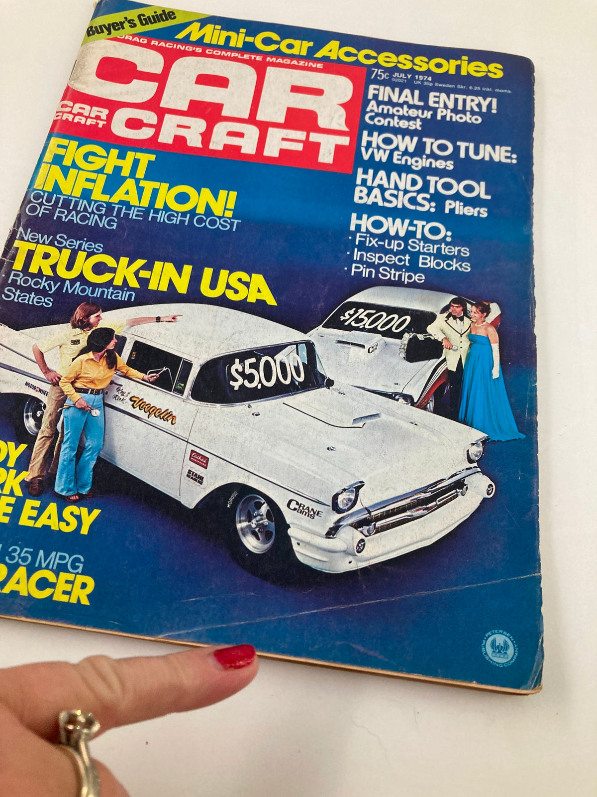 Close-up of the VTG Car Craft Magazine July 1974 Vol 22 #7 cover highlighting car accessories, racing tips, and a vintage car for sale.