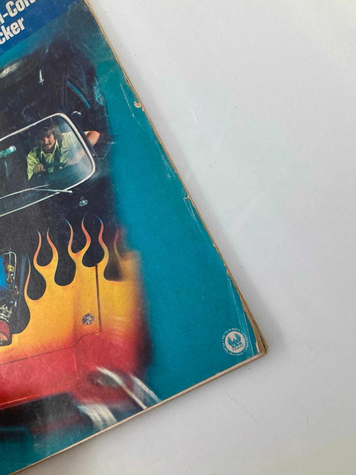 Cover detail of VTG Car Craft Magazine November 1972 Vol 20 #11, showcasing a colorful car design with flames and a driver, highlighting automotive features of the era.
