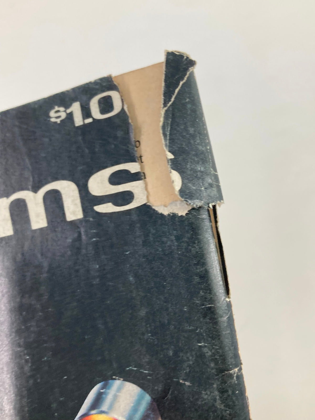 Close-up of the top edge of VTG Popular Hot Rodding Magazine June 1974 Vol 13 #6, highlighting cover damage.