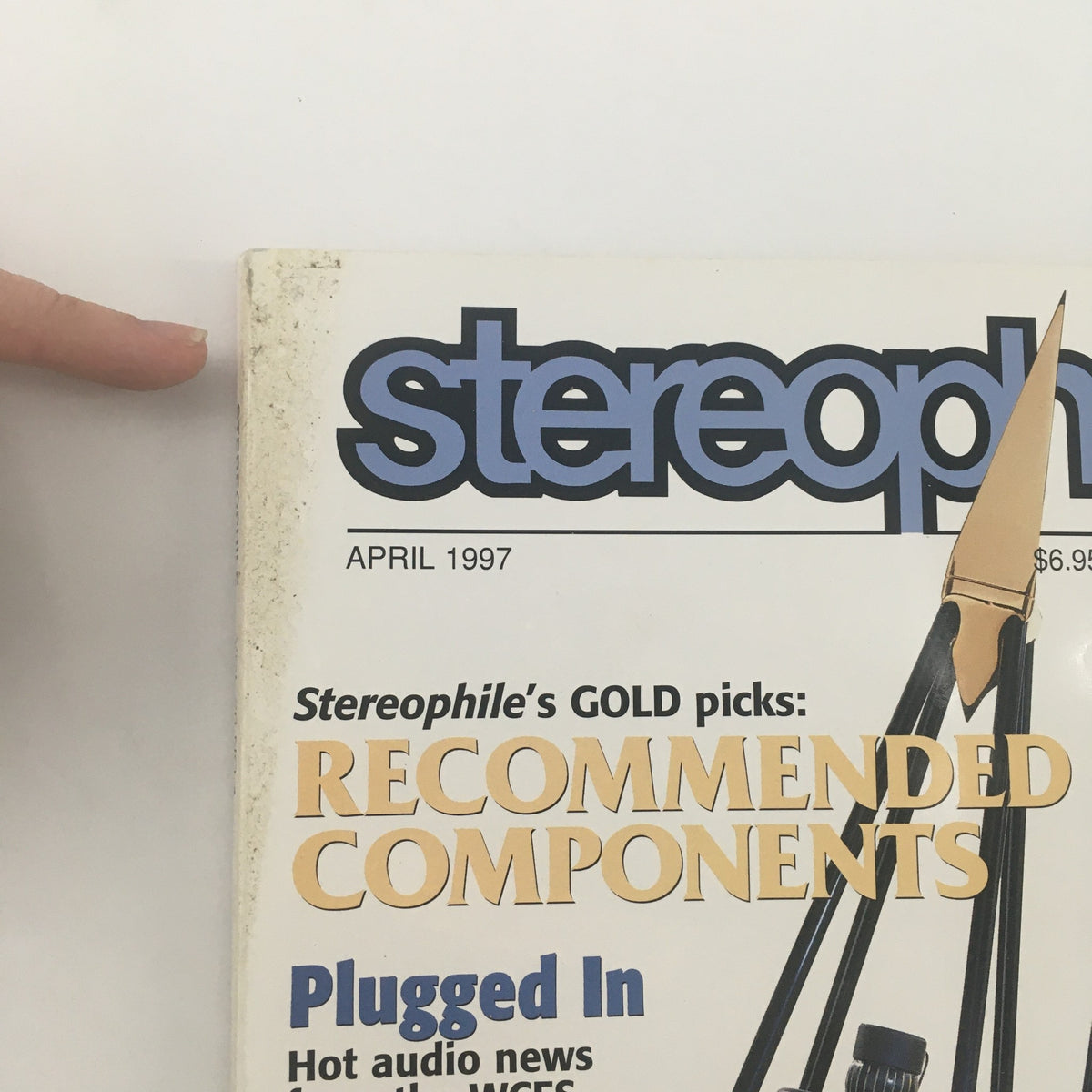 Close-up of the top corner of Stereophile Magazine April 1997, highlighting the weathered edges and details of the cover, featuring Charles Brown related content.