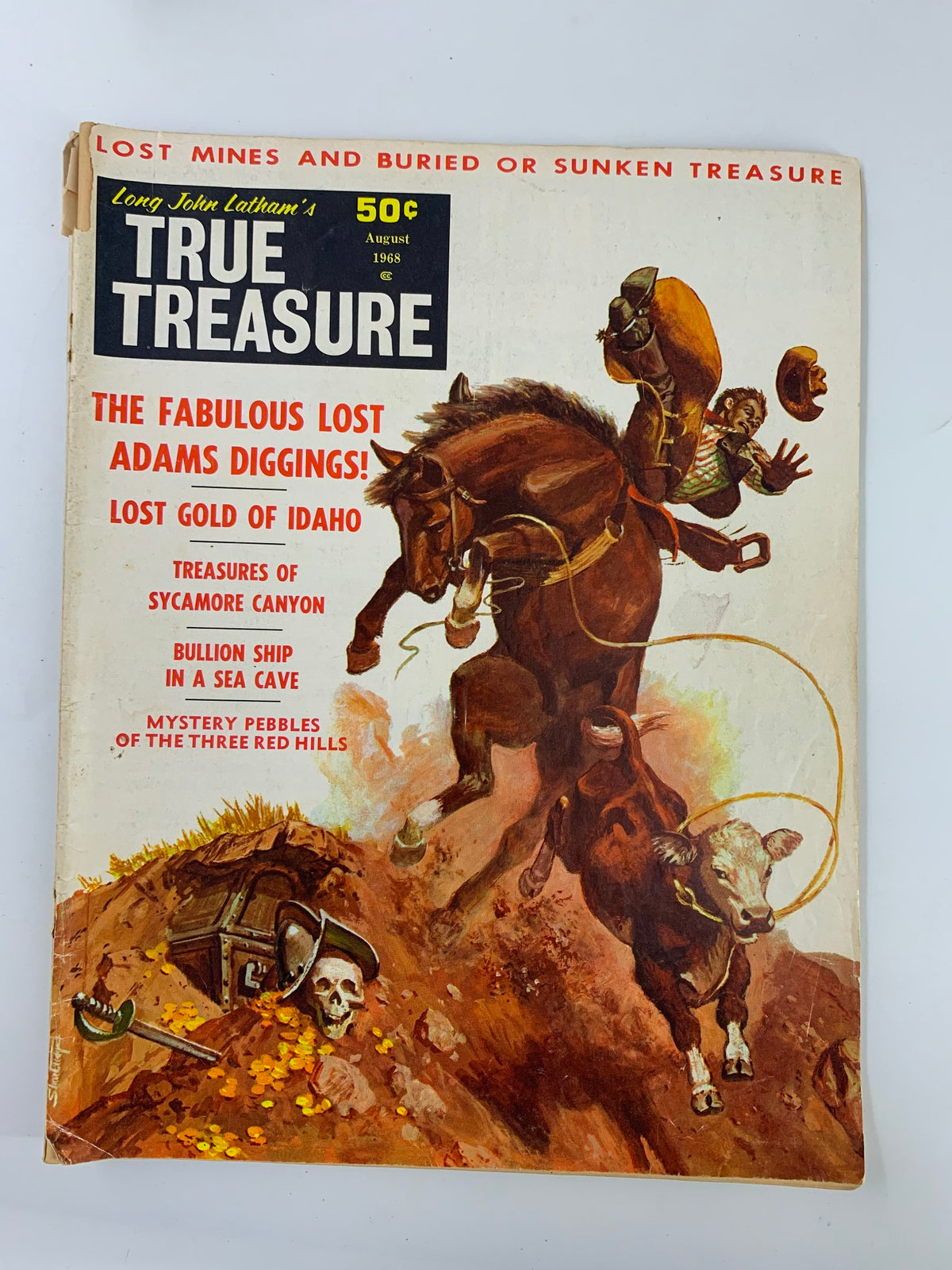 Cover of VTG True Treasure Magazine August 1968 featuring 'The Fabulous Lost Adam Diggings', showcasing an adventurous scene of treasure hunting with a rider on a horse.