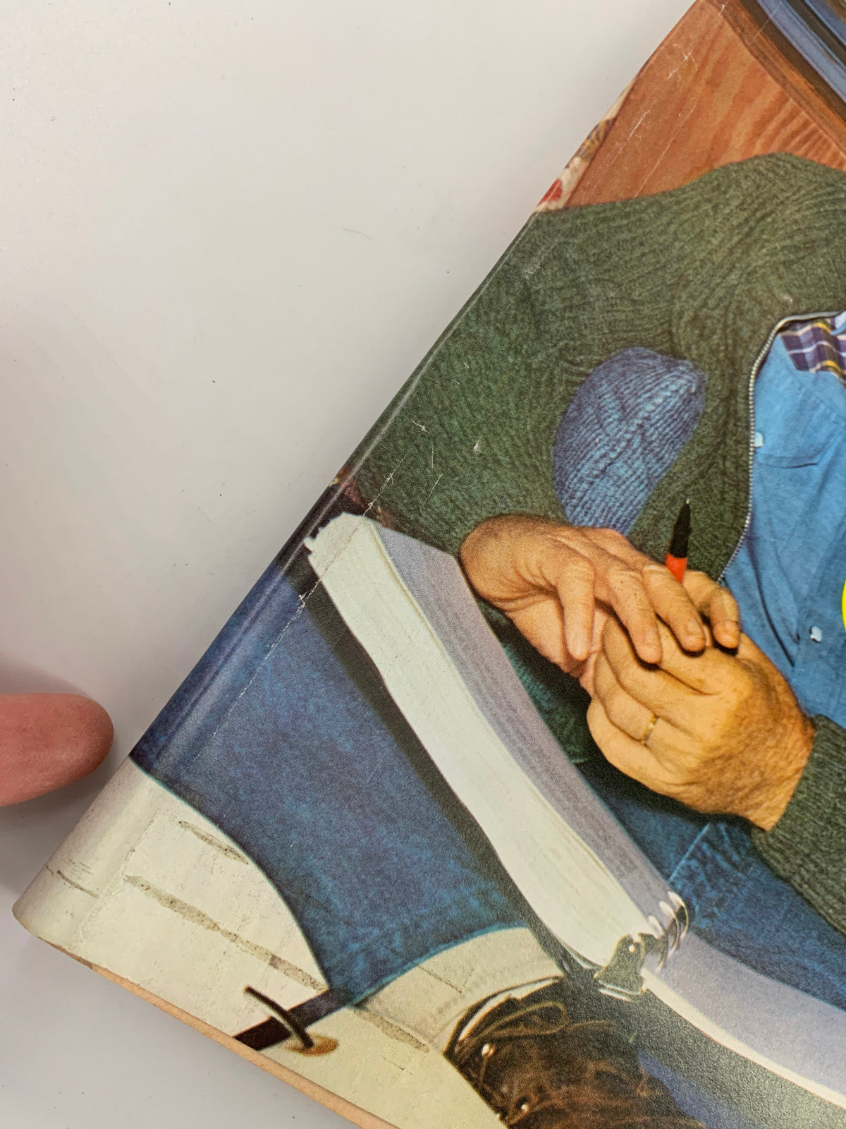 Detailed view of the VTG Newsweek Magazine November 22 1976 showcasing U.S. President Jimmy Carter's hands holding a pen over an open notebook, emphasizing the vintage features.