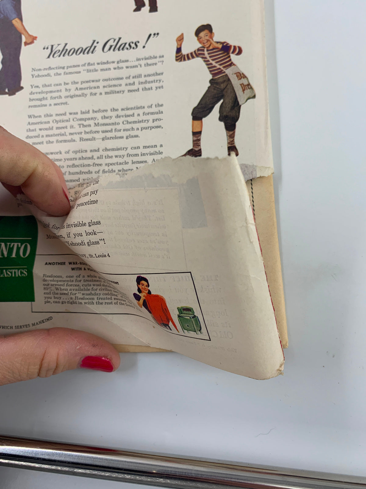Page detail from VTG Newsweek Magazine November 6 1944, showcasing an advertisement for 'Yehoodi Glass!' with colorful illustrations and visible wear around the edges, reflecting its vintage condition.
