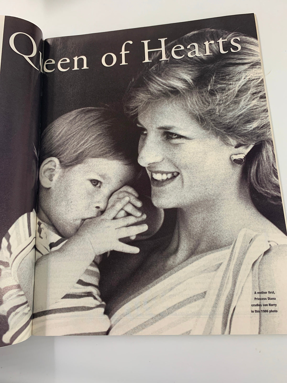 Inside page of TV Guide Magazine 1997 showing Princess Diana with her son, Prince Harry, titled 'Queen of Hearts' highlighting the bond between mother and child.