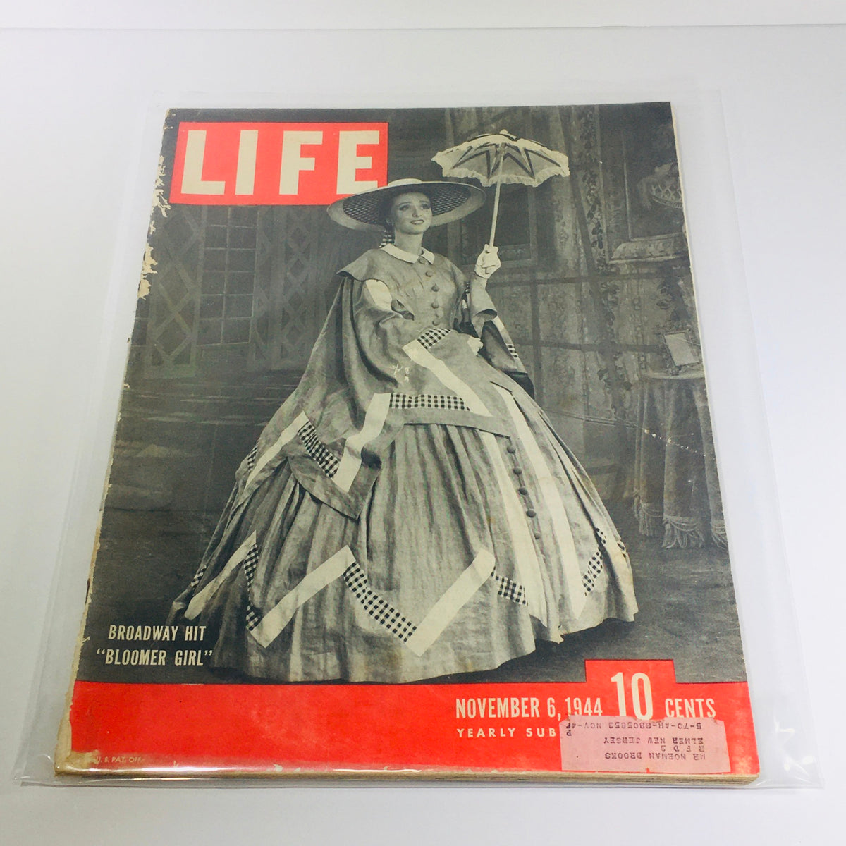 Cover of VTG Life Magazine, November 6, 1944, featuring the Broadway hit 'Bloomer Girl' and showcasing a woman in vintage attire holding an umbrella.