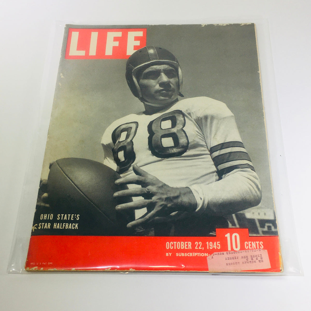 Cover of VTG Life Magazine from October 22, 1945 featuring Ohio State's Halfback, showcasing a vintage football player in a helmet and jersey, alongside the iconic title.