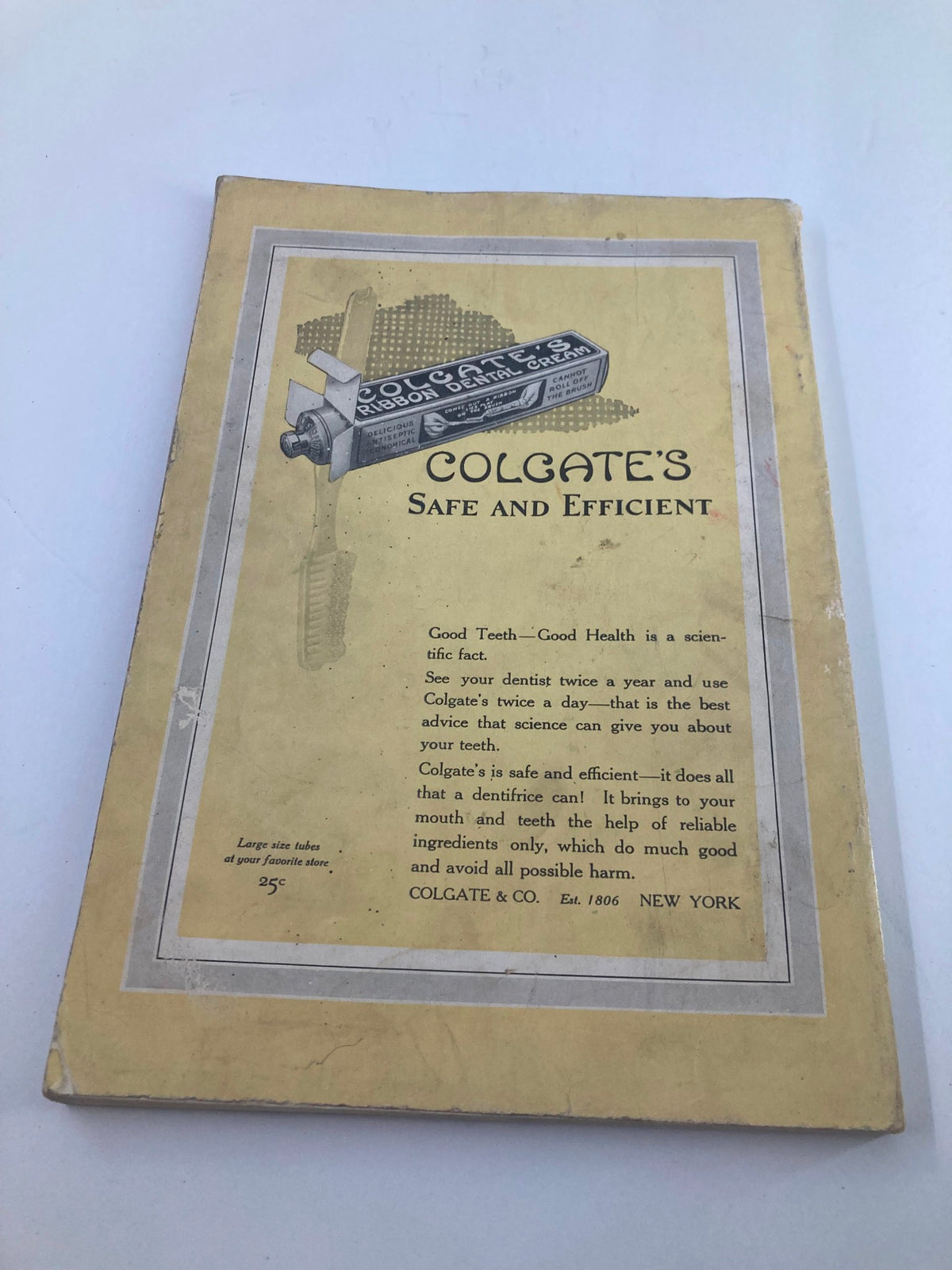 Advertisement for Colgate's dental products from the National Geographic Magazine May 1922, illustrating historical marketing practices.