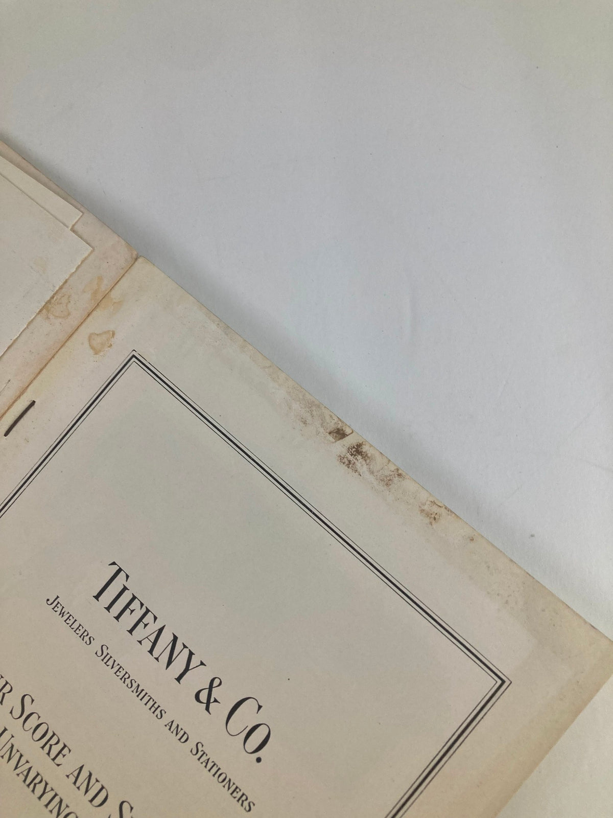 Vintage National Geographic Magazine February 1923 showing a Tiffany & Co. advertisement page with minor wear, contributing to the magazine's collectible character.