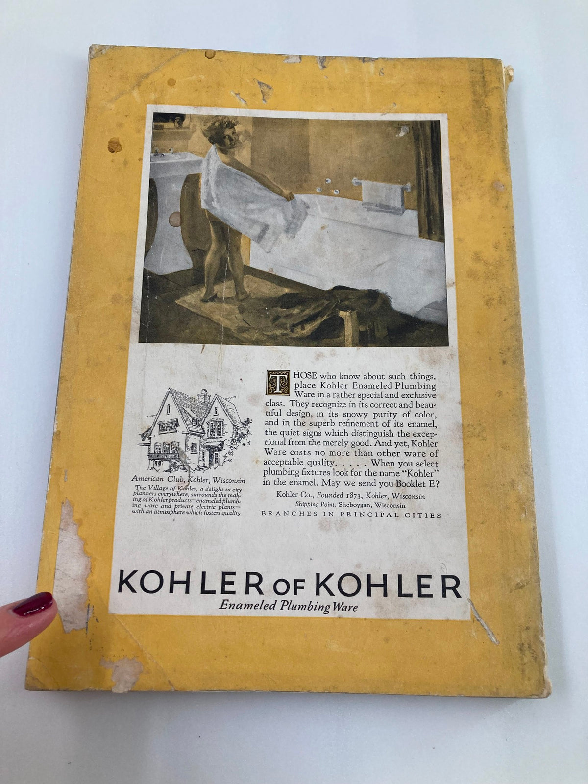 Back cover of VTG The National Geographic Magazine February 1925 featuring an advertisement for Kohler Enameled Plumbing Ware with a vintage aesthetic and visible wear, indicative of its collectible nature.