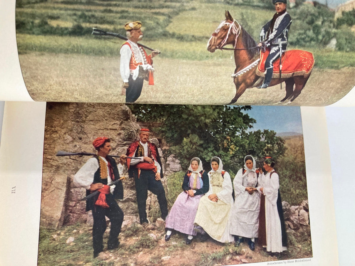 Colorful depiction of traditional Croatian attire and horsemen in a serene landscape from the January 1928 issue of The National Geographic Magazine featuring Dalmatian Days.