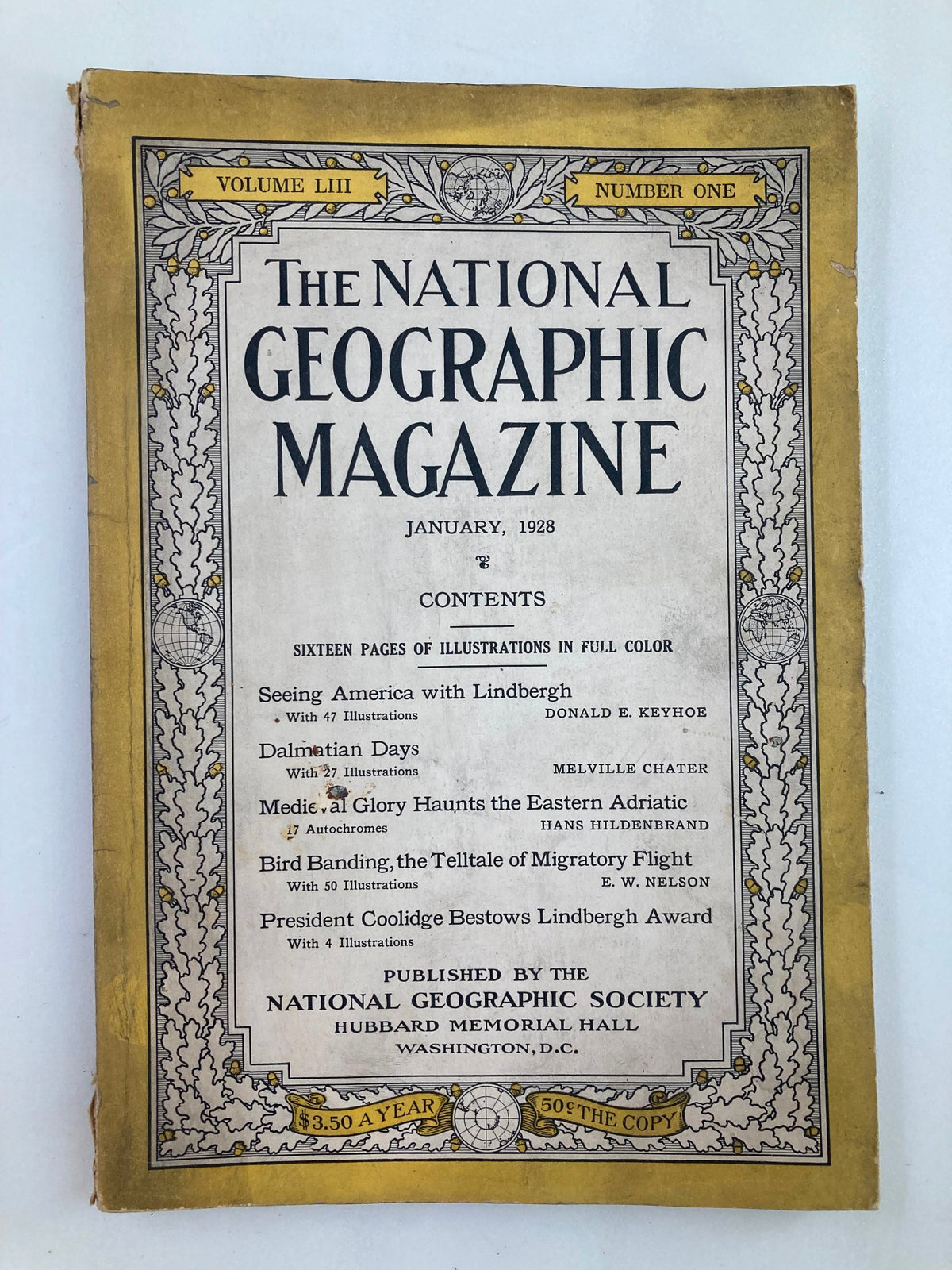 Cover of the National Geographic Magazine, January 1928, featuring Charles Lindbergh, showcasing contents like Seeing America with Lindbergh, Dalmatian Days, and more, emphasizing aviation and cultural themes from the era.