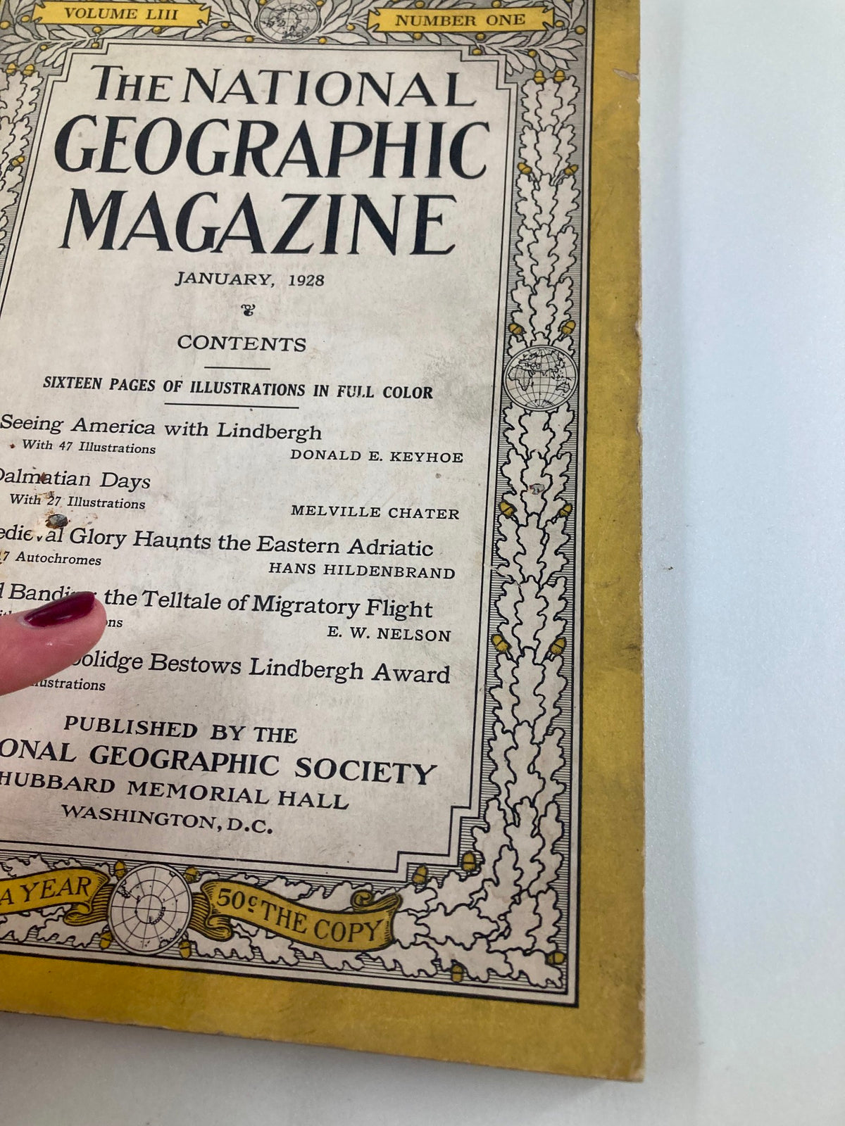 Front cover of the National Geographic Magazine January 1928, highlighting its title and contents, including features on Charles Lindbergh.