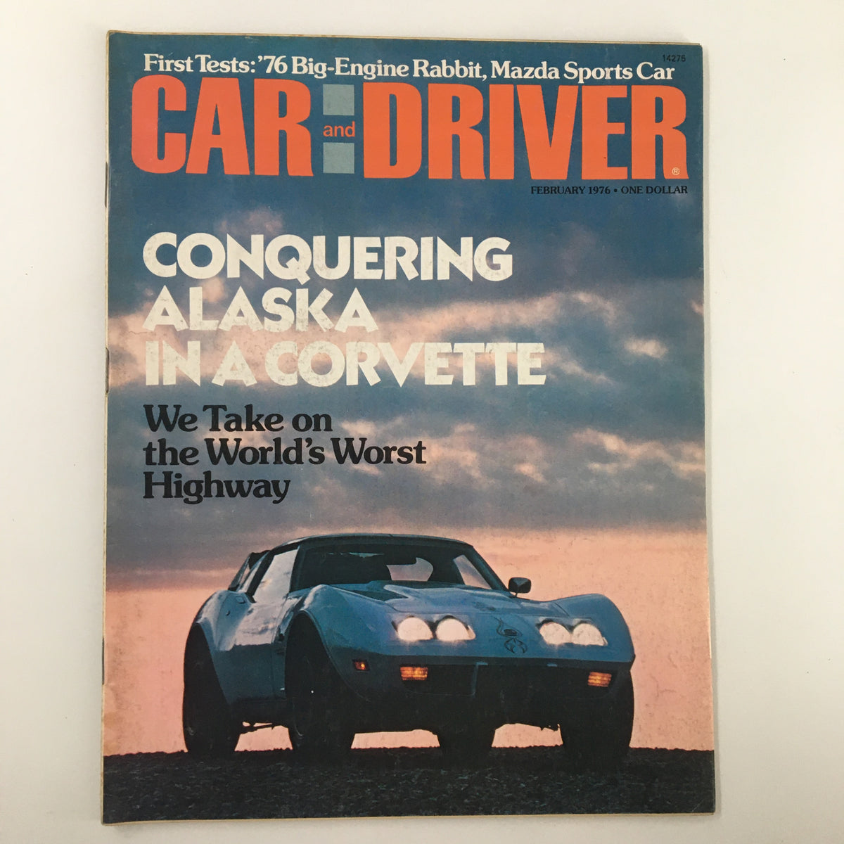 VTG Car and Driver February 1976 cover featuring the title 'Conquering Alaska in a Corvette', showcasing a blue Corvette against a scenic background.