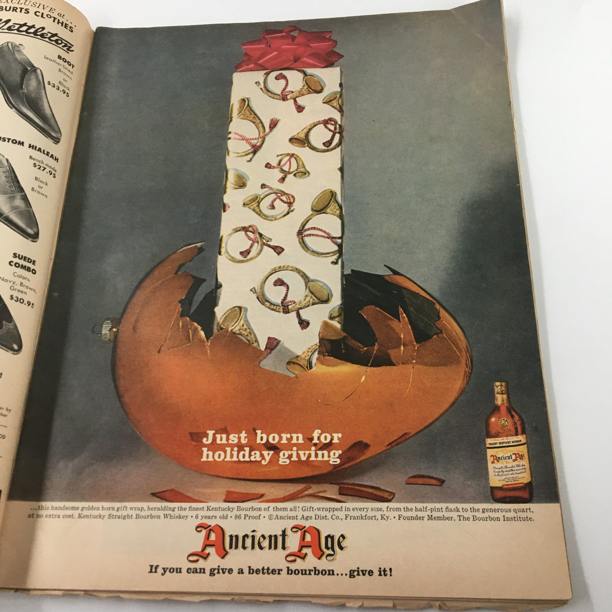 Vintage Ebony Magazine January 1960 advertisement featuring a promotional image for Ancient Age bourbon, emphasizing holiday gift-giving.