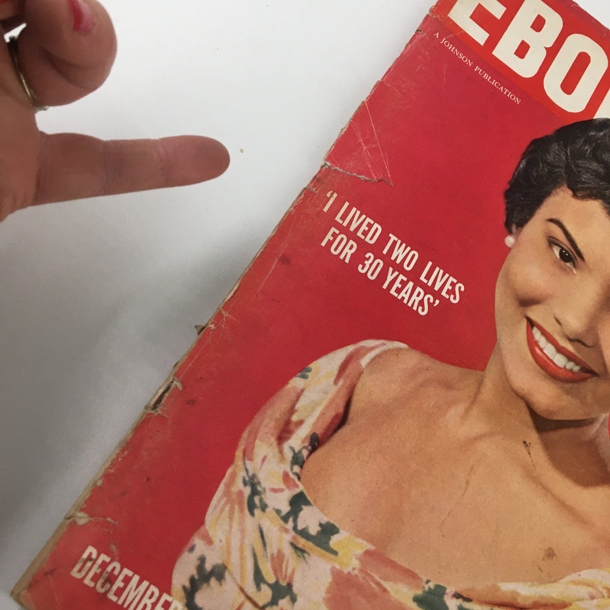 Cover of VTG Ebony Magazine December 1958 featuring a woman in a floral dress and the quote 'I Lived Two Lives for 30 Years.' The magazine represents classic vintage memorabilia highlighting cultural history.
