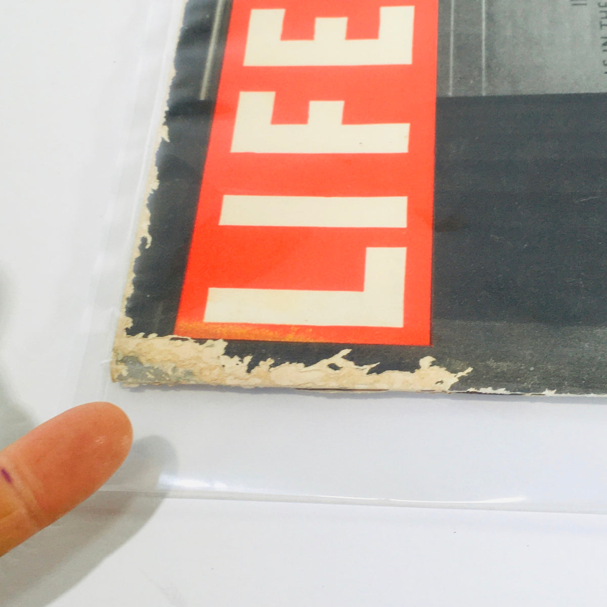 Close-up view of the bottom corner of February 11, 1946 Life Magazine, showcasing the publication's condition with slight wear and the printed price of 10 cents.