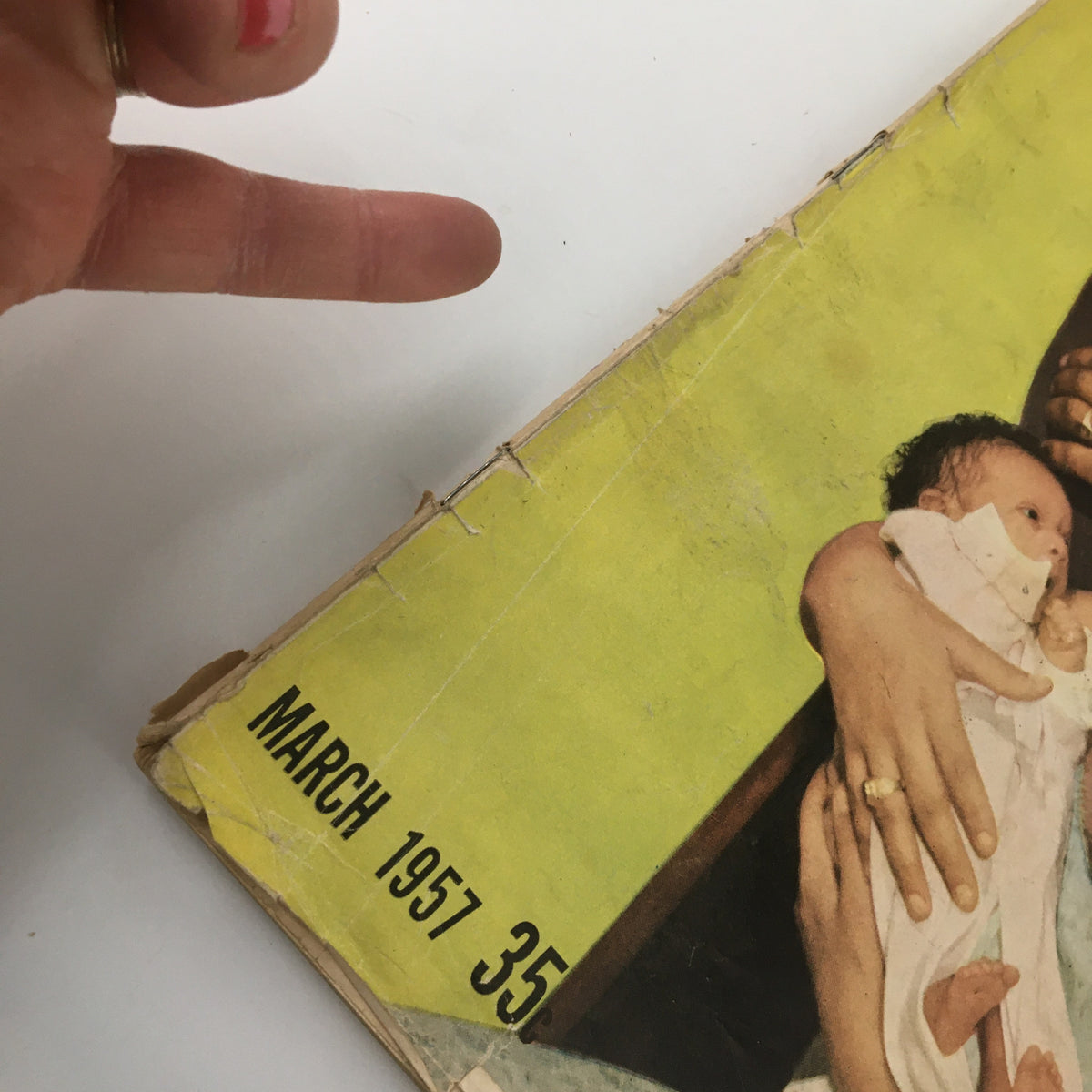 Close-up of the date on the VTG Ebony Magazine March 1957 cover, showing 'MARCH 1957 35' indicating the publication date and price.