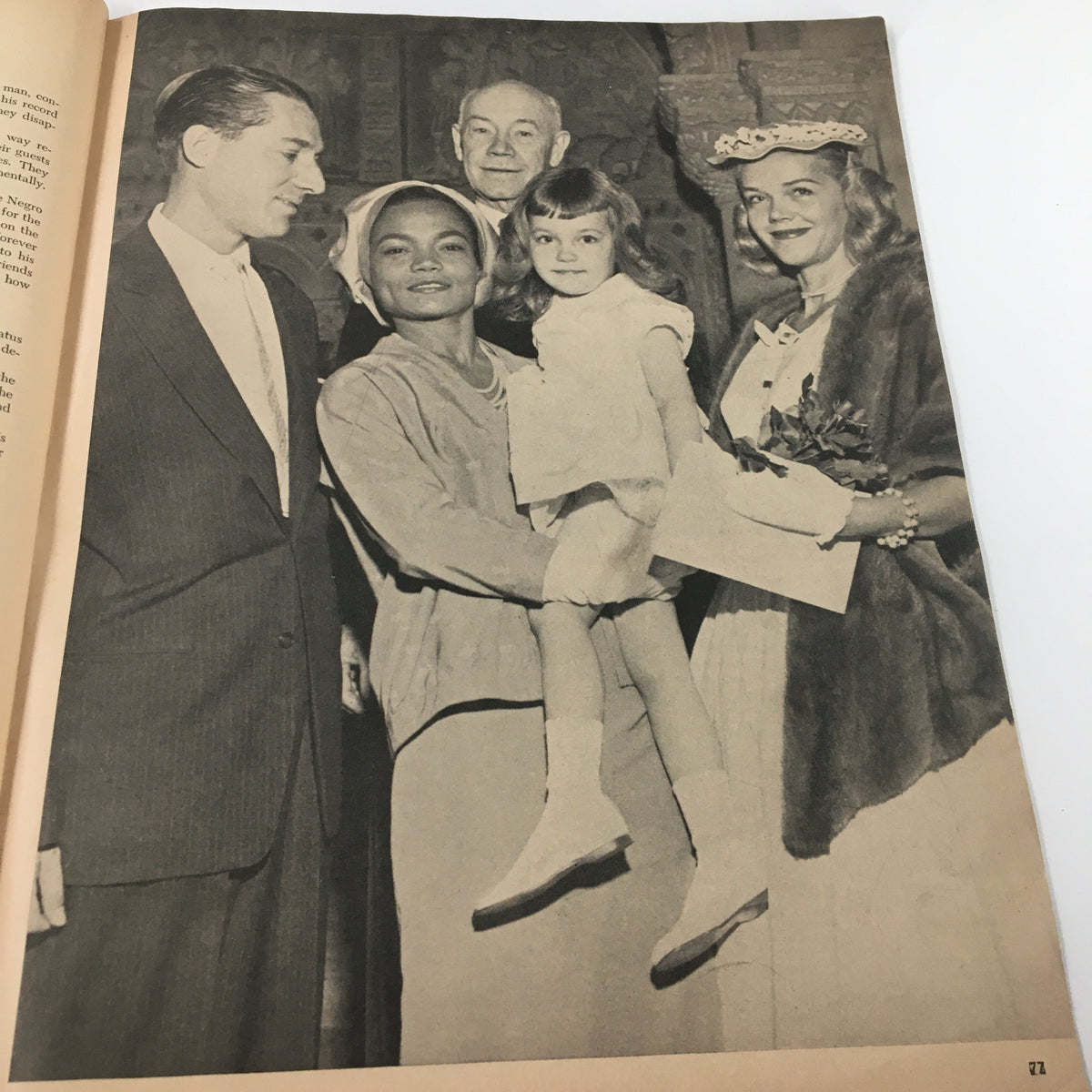 Group photograph from VTG Ebony Magazine March 1957, capturing a moment of social gathering with notable figures and children.
