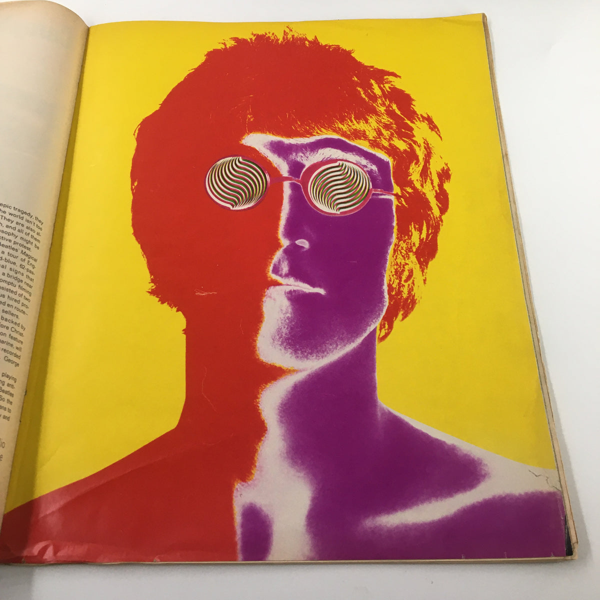 Colorful artistic depiction of John Lennon with psychedelic sunglasses from the VTG Look Magazine January 9 1968, photographed by Avedon.
